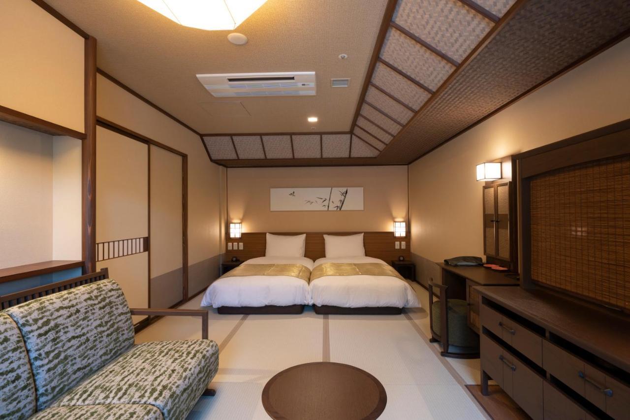 Отель Jozankei Onsen Yurakusoan Саппоро Экстерьер фото
