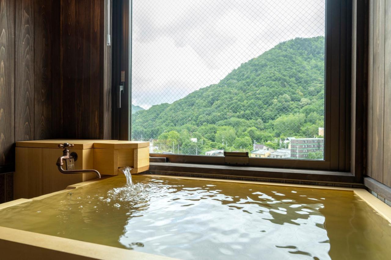 Отель Jozankei Onsen Yurakusoan Саппоро Экстерьер фото